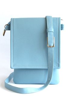 This crossbody bag made of vegan leather is perfect for all sorts of little things that are needed for all women every day.    #veganleather #leathercrossbodybag #crossbodypurse #bagsandpurses #motherdaygift #giftforher #smallcrossbodybag #veganbag  #cellphonebag #cellphonepurse #iphonebag Blue Shoulder Bag For Mobile Phone On-the-go, Blue Shoulder Phone Bag For On-the-go, Blue Phone Bag With Adjustable Strap For On-the-go, Blue Rectangular Phone Bag With Removable Pouch, Blue Crossbody Phone Bag For Everyday, Trendy Blue Rectangular Case Bag, Everyday Blue Phone Bag With Adjustable Strap, Blue Phone Bag With Removable Pouch For Daily Use, Blue Phone Bag With Cell Phone Pocket For On-the-go