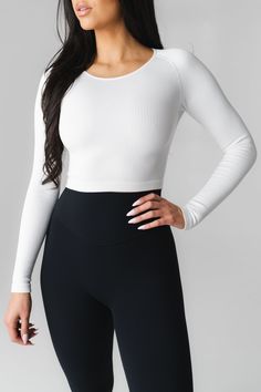 Our Synergy Open Back Long Sleeve is designed for the ultimate comfort and style while offering a sporty addition to your wardrobe. This ribbed top offers medium compression to flatter your figure. Seamless Top, Ribbed Top, Athletic Apparel, Ribbed Fabric, Open Back, Womens Tops, Wardrobe, Long Sleeve