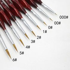 six different types of paint brushes lined up next to each other