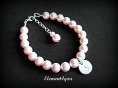 Flower girl bracelet Initial charm bracelet Child by Element4you, $22.95 Elegant Personalized Bracelets For First Communion, Elegant Name Charm Bracelet For Wedding, Elegant Pearl Bracelet For Birthday, Elegant Pink Pearl Bracelet For Birthday, Elegant Round Pearl Bracelet For Birthday, Elegant Customizable Charm Bracelet For Birthday, Elegant Pink Hypoallergenic Charm Bracelet, Elegant Pink Name Bracelet Gift, Elegant Pink Name Bracelet For Birthday