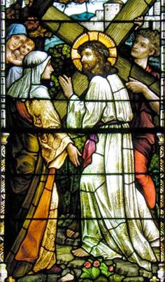 a stained glass window depicting jesus and mary