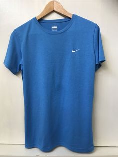 Excellent used condition. Free shipping in the US. Location: LR-12 Nike Fit, Grammar School, Fitted Tee, Blue Nike, Sports Brands, Shirt Short Sleeve, Nike Shirts, Sport T Shirt, Workout Tee