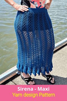 a woman wearing a blue crochet skirt with the words siren - maxi yarn design