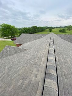 the roof of a building with two rows of shingles