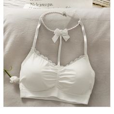 Sexy Bow Halter Lace Camisole Crop Tops – Tomscloth White Halter Neck Camisole With Built-in Bra, White T-back Top With Built-in Bra, White Stretch Cami Halter Top, White Stretch Halter Cami Top, Fitted White Racerback Camisole, White Fitted Racerback Camisole, White Cami Halter Top, White Cami Halter Top With Straps, White Sleeveless Bra-friendly Halter Top