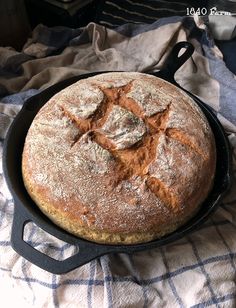 a baked bread in a cast iron skillet