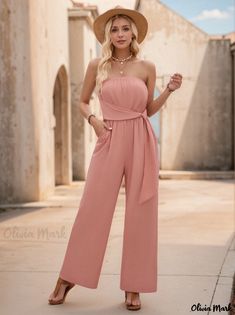 Olivia Mark - Solid Color Strapless Waist-Tied Jumpsuit for Casual Resort Getaways Solid Strapless Jumpsuit For Spring Beach, Spring Beach Strapless Solid Jumpsuit, Solid Color Tie Waist Jumpsuits And Rompers For Beach, Solid Color Vacation Jumpsuits And Rompers With Tie Waist, Casual Pink Strapless Jumpsuit For The Beach, Solid Strapless Summer Jumpsuit For Spring, Strapless Solid Jumpsuit For Spring And Summer, Strapless Jumpsuit For Spring And Summer, Strapless Sleeveless Jumpsuit With Tie Waist For Spring