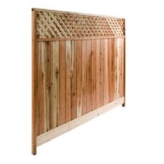 a wooden fence with lattice design on it