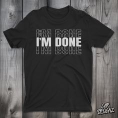 Make a statement with this bold "I'm Done" black t-shirt featuring stark white text that pops against the dark background. Perfect for expressing a sense of completion or frustration in a stylish way, this unisex tee is a must-have for casual outings or as a conversation starter. Made with comfortable, breathable fabric, it's designed to fit effortlessly into anyone's wardrobe. Whether it's the end of a tough project, a long week, or you're just over it, this shirt says it all without you having Black Relaxed Fit T-shirt With Funny Text, Black Slogan Shirt For Streetwear, Black Tops With Funny Text For Streetwear, Black Crew Neck T-shirt With Funny Text, Black Graphic Tee Shirt With Funny Text, Relaxed Fit Black Shirt With Funny Text, Black Relaxed Fit Shirt With Funny Text, Black T-shirt With Funny Text In Relaxed Fit, Just Over It