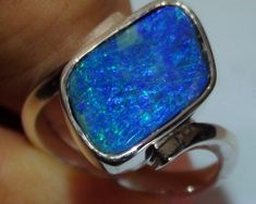 925 Solid Silver Ring With Blue Green Boulder Opal Blue Sterling Silver Ring, Blue Opal Ring For Anniversary In Fine Jewelry Style, Classic Blue Jewelry Stamped 925, Classic Blue Sterling Silver Jewelry, Unique Blue Sterling Silver Jewelry, Blue Sterling Silver Fine Jewelry Ring, Blue Sterling Silver Rings With Polished Finish, Fine Blue Hallmarked Jewelry, Blue Opal Ring For Formal Occasions