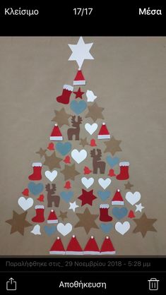 a christmas tree made out of paper with hearts and stars