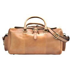 Combo Offer: 24 Inch Tan Color Genuine Leather Weekend Bag with dopp kit Our Large Weekender Travel Bag is ideal for decadent weekends away. It's hand-crafted from the finest full-grain Indian buffalo leather and features a fabric-lined interior and antique brass hardware for a flawless finish. Free personalization & customization Dimension (Duffle Bag): 24x11x11 Inches Dimension (Toiletry Bag) : 9x4x4 Inches COLOR DISCLAIMER There might be a Slight Variation in Color due to Photography / Light effects & also due to computer color resolution. Leather Wedding Gifts, Airplane Bag, Indian Buffalo, Weekend Duffle Bag, Travel Airplane, Leather Holdall, Leather Duffel Bag, Leather Weekender Bag, Leather Duffel