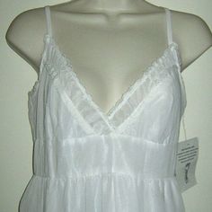 Vintage Beautifully Designed Sheer Crinkle Like Lined Lace Trim White Adjustable Strap Girly Sexy Empire Waist Summer Sun Fun Dress Size Medium. It Is A Must Have For The Summer. Great For The Summer And Beyond. Chest 32 Inches Waist 28 Inches Hip 48 Inches Length 39 Inches Plus. Thank You For Looking, Have A Great Day. Summer V-neck Ruffled Sleepwear, Summer V-neck Sleepwear With Ruffles, White Sleeveless Flirty Sleepwear, Summer Ruffled V-neck Sleepwear, Flirty V-neck Sleepwear For Spring, Flirty Fitted Summer Sleepwear, Flirty V-neck Spring Sleepwear, Flirty Fitted Sleepwear For Summer, Summer Sleep Tops With Ruffles