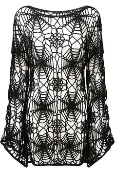 a black and white top with lacy crochet on the front, featuring an openwork design