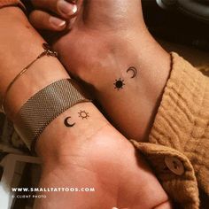 two people with matching tattoos on their arms