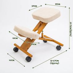 an image of a wooden stool with wheels and footrests on the bottom side