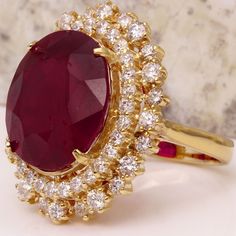 19.26 Carats Impressive Red Ruby and Diamond 14K Yellow Gold Ring Suggested Replacement Value $8,400.00 Total Red Ruby Weight is: 17.36 Carats (glass filled) Ruby Measures: 15.74 x 13.96mm Natural Round Diamonds Weight: 1.90 Carats (color G / Clarity VS2-SI1) Ring total weight: 11.6 grams Disclaimer: all weights, measurements and colors are approximate and may vary slightly from the listed dimensions or as seen in the image. All pictures are magnified to show the smallest of details. Please, ref Ruby Jewelry Ring, Ruby Ring Designs, Gold Jewelry Outfits, Ruby Diamond Rings, Bollywood Jewelry, Etsy Gold Ring, Royal Jewels, Silver Jewelry Fashion, Ruby Jewelry