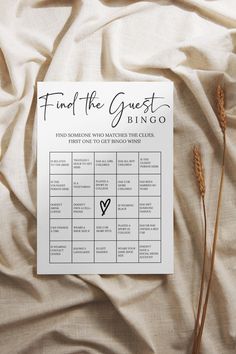 a wedding game is shown on top of a bed with the words find the guest