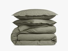 three pillows stacked on top of each other