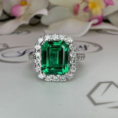 🐣. Offer Xtras! Emerald cut emerald with moissanite halo engagement ring 14k solid gold, unique vintage green emerald ring, May birthstone ring ladies #6081 for $1219.00 #MayBirthstone #EmeraldCut #BespokeJewelry #MoissaniteHalo #AnniversaryRing #14kSolidGold #EngagementRing #GreenEmerald #UniqueVintage #RingLadies Emerald Ring Vintage Zales, Emerald Pendants, Moissanite Halo Engagement Ring, May Birthstone Rings, Halo Engagement Ring Sets, Emerald Wedding Rings, Moissanite Engagement Ring Halo, Emerald Rings, Green Emerald Ring