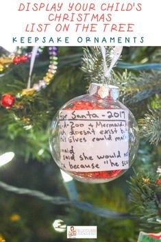 a christmas ornament hanging from a tree with the words, display your child's list on the tree