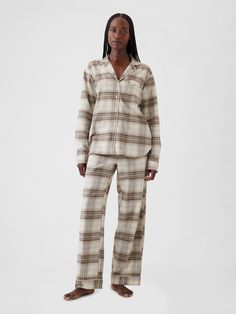 Soft cotton flannel pajama shirt and pants set.  Notch collar, button front.  Long sleeves.  Elasticized waist at PJ pants.  Assorted allover prints.  Note: This pajama set comes pre-wrapped and ready to gift for the holiday season.  Fit: Relaxed.  An easy silhouette throughout.  Models wearing Gap Teacher Pajamas Day Outfit, Christmas Morning Pajamas, Fall Pajamas, Winter Pjs, Flannel Pjs, Shirt And Pants Set, Easy Silhouette, Pajama Day, Christmas Flannel