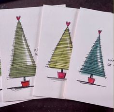 four christmas trees are shown in three different colors