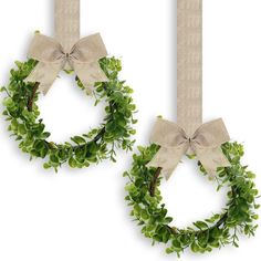 PRICES MAY VARY. What you will receive: the package contains 2 pieces of faux kitchen cabinet wreaths, the quantity is sufficient to fully satisfy your various decoration needs, and allows you to share with others Quality material: the artificial boxwood wreath is mainly made of plastic, rattan and fabric, not easy to fade and no maintenance required, hard to be deformed, reliable and sturdy to support a long time of application Size information: the diameter of the boxwood wreath is about 25 cm Wreaths With Ribbon, Kitchen Cabinet Wreaths, Window Front Door, Cabinet Wreaths, Boxwood Wreaths, Hanging Wreaths, Christmas Decorations Apartment, Christmas Apartment, Cabinet Wall