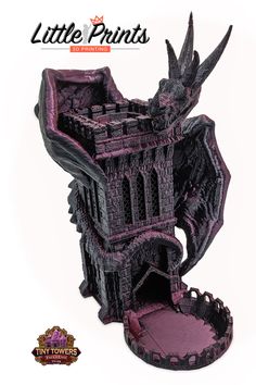 an image of a miniature castle made out of plastic and painted with dark purple paint