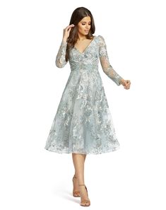 Sheer long sleeve midi dress with floral applique and embroidery. Mac Duggal Partially Lined 100% Polyester Back Zipper V-neck Long Sleeve Midi & Tea Length Approx. length from shoulder to hem: 44" Style #70230 Tulle Cocktail Dress, Mac Duggal Dress, A Line Cocktail Dress, Mac Duggal Dresses, Sheer Long Sleeve, Mac Duggal, Tea Length Dresses, Cocktail Dress Lace, Sleeve Midi Dress