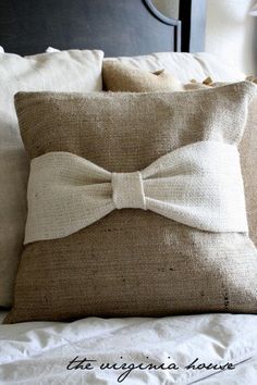 a pillow with a bow tie on it