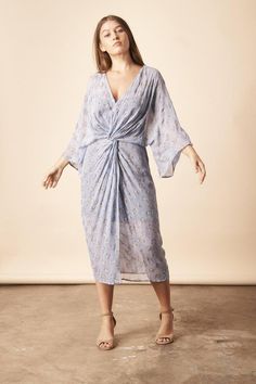 Our sheer twisted kimono dress brings the magic to any special occasion. Featuring our ethereal Gingko Leaf print in silver and ice blue, this dress has a super flattering twist at the waist and relaxed kimono sleeve. Plus it comes with a stretchy slip dress to wear underneath so no need to worry about wardrobe malfunctions. Perfect for your friend's upcoming wedding or that Bali trip you've been planning. Pair with strappy sandals to dress it up or throw on some wedges for a chic comfy look. FI Chiffon Outer, Boho Brand, Hippie Look, Ginkgo Leaf, Bohemian Look, Block Dress, Kimono Dress, Kimono Sleeve, Leaf Print