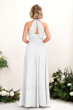 the back of a bridesmaid's dress in sage green