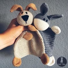 two crocheted stuffed animals in the shape of dogs