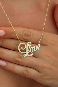 14k 18k Solid Gold Love Script Necklace for Women, Cursive Love Letter Necklace, Delicate Valentines Necklace, Script Font Jewelry Our gold necklaces are perfect choice for a Christmas, Mother's Day, valentine's day, birthday, wedding, anniversary, graduation, engagement, bridesmaid, and best friends gift. It's a good way to show appreciation to your mom, girlfriend, wife, grandmother, grandchildren, daughter, sister, best friend, boss or a co-worker. Also, a special treat just for yourself.   F 14k White Gold Name Necklace For Weddings, Wedding Fine Jewelry Name Necklace Pendant, Wedding Necklace In Sterling Silver Stamped 14k, 14k Gold Fine Jewelry Necklaces For Anniversary, Fine Jewelry 14k Gold Wedding Name Necklace, Dainty Hallmarked Wedding Name Necklace, White Gold 14k Charm Necklaces For Wedding, Delicate 14k Gold Name Necklace For Anniversary, 14k Stamped Necklace For Valentine's Day Anniversary Gift