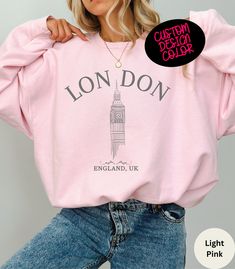 Stay cozy in our Unisex London Sweatshirt! Embrace city vibes with this stylish London Hoodie. Perfect travel sweatshirt and London gift souvenir, featuring iconic London England design. 🇬🇧  ✦ KEY FEATURES Gildan 18000 ADULT Crewneck Sweatshirt UNISEX (NOT WOMEN'S SIZE) heavy blend crewneck sweatshirt made from 50% Cotton and 50% Polyester. Loose fit, runs true to size. Strong, resistant to most chemicals, stretching and shrinking.  ✦ KEY FEATURES Gildan 18500 ADULT Pocketed Hoodie UNISEX (NOT WOMEN'S SIZE) heavy blend hooded sweatshirt made from 50% Cotton and 50% Polyester. Classic fit, RUNS TRUE TO SIZE. Medium-heavy fabric. Polyester fibers are extremely resilient, resistant to most chemicals, stretching, and shrinking. ✦ SIZING Please refer to the sizing chart in the pictures above Cozy Fit Crew Neck Hoodie With Letter Print, Urban Winter Tops With Slogan, Trendy Crew Neck Hoodie With Screen Print, Trendy Cozy Fit Hoodie With Crew Neck, Trendy Crew Neck Hoodie With Cozy Fit, Pink Crew Neck Hoodie For College, Crew Neck Hoodie With Slogan For Loungewear, Trendy Crewneck Hoodie With Screen Print, Relaxed Fit Crew Neck Hoodie With Slogan