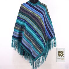 These ponchos are handmade by artisans from Cusco-Peru, a living Inca city. Our artisans who still preserve the traditional way weave by hand using Alpaca wool. Our very warm and cozy ponchos! ❤ With unique techniques and designs, these ponchos are handmade by Quechua artisans in the Andes. These luxurious wool ponchos are not only stunning and special but will keep you super warm in winter and fall. When cared for properly, these ponchos will last for years. The stunning and eye-catching design Handmade Cape Shawl, Handmade Artisan Poncho For Fall, Handmade One Size Poncho Shawl, One Size Woven Poncho Shawl, Handmade Artisan Poncho For Festivals, Handmade Winter Shawl Poncho, Handmade One Size Cape Shawl, Artisan Multicolor One Size Poncho, Handmade Artisan Shawl For Winter