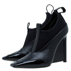 Authentic Balenciaga Size 40 Booties With Neoprene Fabric. These Will Fit A Size 9 Or Narrow Foot 9.5. If You Have Wide Feet, These Are Not For You (Unless You're A Size 8.5-9). Purchased Dubai 2017. Worn 5-6 Times, No Major Scratches Or Damages. Tiny Bit Of Creasing At Foot Bed. Foot Bed Is Padded But The Heel Is 4-5 Inches And You Should Be A Confident Heel Walker To Sport These. (They Are, Indeed, Dead Sexy If You Can ... Looks Amazing With Cuffed Jeans And Dresses. Boss Lady Vibes.) Black Slip-on Evening Heels, Black Slip-on Heels For Evening, Designer Heels With Rubber Heel Cap And Pointed Toe, Neoprene Fabric, Balenciaga Black, Cuffed Jeans, Balenciaga Shoes, And Dresses, Boss Lady