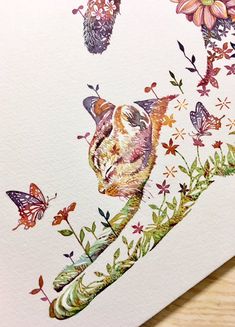 a watercolor painting of a cat sitting on a branch with flowers and butterflies around it