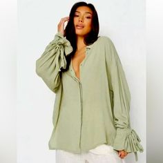 Missguided Khaki Slv Xtreme Oversize Cheesecloth Tie Sleeve’s Blouse Top Shirt Cheesecloth Button Front Hidden Buttons Light Green 22” Armpit To Armpit 26.5 Shoulder To Hem New With Tags Womans Size 8/P Oversized Button-up Top For Brunch, Oversized Green Blouse For Day Out, Relaxed Fit Long Sleeve Shirt For Brunch, Chic Oversized Green Blouse, Oversized Long Sleeve Blouse For Brunch, Oversized Khaki Blouse For Spring, Green Blouse With Roll-up Sleeves For Spring, Oversized Cotton Blouse For Brunch, Khaki Top With Roll-up Sleeves For Spring