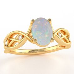 Celtic trinity motif diamond curles ring with an oval shape opal center stone crafted in solid 10k gold. Opal is the birthstone of October and symbolizes confidence, reliability, and faithfulness. Diamonds are thought to provide the wearer with better relationships and increase inner strength. Genuine Opal: Qty: 1 x 5x7 Oval Cut Stone Genuine Diamonds: .05 caratsQty: 2 x 1.3mm Round H|IQty: 2 x 1.6mm Round H|IAll of our products are available in 925 Sterling Silver, Solid 10k/14k/18k Yellow/Whit Yellow Gold Opal Birthstone Ring, Oval Shape, Oval Opal Birthstone Ring In Yellow Gold, Gold Oval Opal Birthstone Ring, Oval Opal Birthstone Ring In 14k Gold, 14k Gold Oval Opal Birthstone Ring, Yellow Gold Oval Opal Promise Ring, Oval Opal Birthstone Ring Fine Jewelry, 14k Gold Oval Opal Promise Ring, Oval Opal Promise Ring In 14k Gold