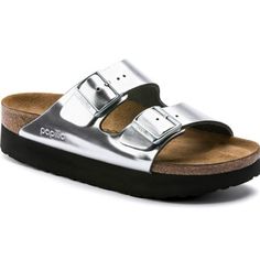 Birkenstock Presents Contemporary Design With Their 'Papillio' Women's Arizona Double Strap Sandals In Metallic Silver. The Two-Strap Sandal Has A High-Quality Natural Leather Upper With A Chrome-Silver Reflective Film Finish. Front And Back Bevels Provide Support While Walking, And The Straps Are Secured With Colour-Coordinated Tongue Buckles. The Cork-Latex Footbed Was Designed With Foot Anatomy In Mind To Ensure Comfort, And The Eva Sole Rests On A 25mm Heel. Upper: Leather. Lining: Suede. Fo Silver Sandals With Cushioned Footbed In Synthetic Material, Silver Synthetic Sandals With Cushioned Footbed, Silver Sandals With Cushioned Footbed, Modern Silver Sandals With Buckle Closure, Silver Flat Heel Sandals With Buckle Closure, Casual Silver Round Toe Sandals, Silver Leather Sandals With Flat Heel, Silver Closed Toe Casual Sandals, Casual Silver Flat Heel Sandals