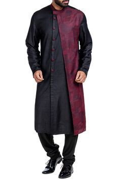 Trending kurta ensemble in the tone of black is tailored finely with a thoughtful design concept. It is featured with an interesting single side contrast embroidered flap detail. A splendid option to keep your style voguish for the festive occasion.
No of components: 2
Embroidered Single Flap, Collar and Buttons
Kantha Embroidery
Stand Collar
Full Sleeves
Buttoned Placket
Plain Black Churidar - Aza Fashions Black Churidar, Black Kurta, Indian Groom Wear, Gents Kurta Design, Gents Kurta, Kurta Set For Men, Mens Kurta Designs, Mens Kurta, Kurta Design