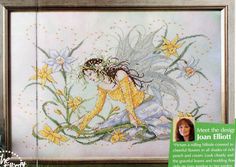 the cross stitch book features an image of a fairy with flowers