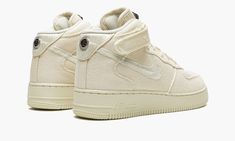 The Stussy x Nike Air Force 1 Mid “Fossil” is one of multiple colorways of the retro basketball shoe co-designed by the California based streetwear brand and released in May 2022.  The Air Force 1 Mid “Fossil” is a popular release by Stussy and Nike that follows the brand’s previous collaboration on the Air Force 1 from 2020.  The design features a fossil or beige hemp base with tonal hemp overlays.  The Swoosh logo on the sides is designed in a woven textile.  Classic “Stussy” branding is embro Stussy Fossil, Nike Air Force 1 Mid, Retro Basketball Shoes, Nike Air Force 1 High, Cute Shoes Heels, Air Force 1 Mid, Streetwear Shoes, Air Force 1 High, Nike Air Force 1 Low