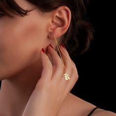 Made of sterling silver, the earrings is a shining accessory you'll find yourself wearing day in day out. Metal: 925 sterling silver Plating: 18k gold Letter size: 10 mm - 7 mm (0.39" - 0.27") Total length: approx. 10 cm / 3.93" Hypoallergenic: nickel-free materials used therefore suitable for those with metal allergies Yellow Gold Sterling Silver Cartilage Earrings As Gift, Sterling Silver Tarnish-resistant Cartilage Earrings As Gift, Hypoallergenic Yellow Gold Sterling Silver Earrings, Silver 14k Gold Threader Earrings As Gift, Yellow Gold Drop Cartilage Earrings As Gift, Single Yellow Gold Earring As Gift For Her, Sterling Silver Tarnish Resistant Cartilage Earrings For Anniversary, Elegant Yellow Gold Cartilage Earrings In Sterling Silver, Elegant Yellow Gold Sterling Silver Cartilage Earrings