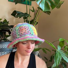 hand crocheted multicolored bucket hat. the slightly floppy brim can be shaped loosely. stretchy and comfy and cute! this hat is a bit oversized, allowing a comfy loose fit. Colorful Adjustable Casual Crochet Hat, Casual Adjustable Colorful Crochet Hat, Casual Colorful Adjustable Crochet Hat, Colorful Adjustable Crochet Hat, Multicolor Wide Brim Crochet Hat For Spring, Multicolor Wide Brim Crochet Hat, Colorful Casual Wide Brim Hat, Casual Colorful Wide Brim Hat, Colorful Casual Bucket Hat