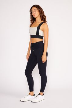 Product Details A contemporary twist on the classic everyday legging. Made from our new UltraLuxe performance fabric, providing creamy softness and excellent support. High waist with wide waistband and the front drawstring design for added sporty accents, all tailored for comfort and functionality. Inseam 26". Pair them with the matching Ali bra tank for a set look. Medium support for workouts & every day. Materials & Care Composition: 75% Nylon, 25% Lycra. With four-way stretch for full mobilit Black 4-way Stretch Leggings For Loungewear, Chic High Stretch Yoga Pants For Workout, Chic Stretch Activewear, Chic Stretch Activewear For Sports, Chic Stretch Activewear For Gym, Sporty 4-way Stretch Leggings For Loungewear, Chic High Stretch Activewear For Gym, Chic Compressive Activewear For Workout, Chic High-stretch Activewear For Workout