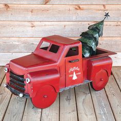 What better way to celebrate a farmhouse holiday than with this Christmas Truck that measures in over 4 feet long! This outstanding truck will bring the holiday spirit to any home or shop. The tree detaches to save on space and shipping and the wheels spin freely on this unique piece. Farm Trucks Christmas Tree, Christmas Tree With Wheels, Truck Tree Stand, Kirklands Christmas Truck, Truck And Christmas Tree, Wooden Christmas Tractor, Farmhouse Truck Christmas Tree, Christmas Truck With Tree, Farmhouse Holiday