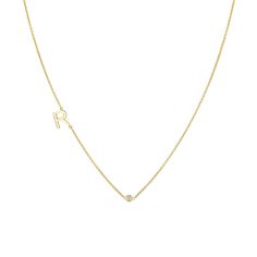 The 14k Letter Diamond Bezel Necklace is handset with a 0.05ct solitaire diamond. 

Approx. 0.05cts
6mm - 1/4" Letter Height
High Quality G Color VS2 Clarity Natural Diamonds
Solid 14K Gold
Lifetime Guarantee
Made in Los Angeles Mean To Be, Bezel Necklace, Single Letter, 14k Gold Necklace, Solitaire Diamond, Bezel Diamond, Recycled Gold, Rose Gold Necklace, Metal Necklaces